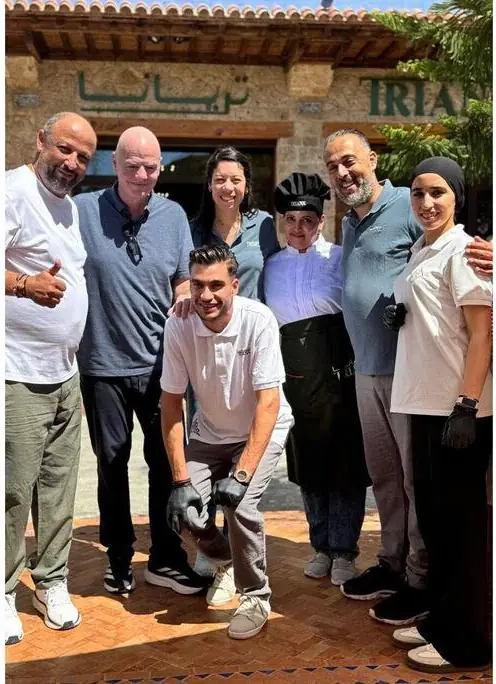 Triana team with distinguished guest Gianni Infantino, FIFA President, at the restaurant entrance