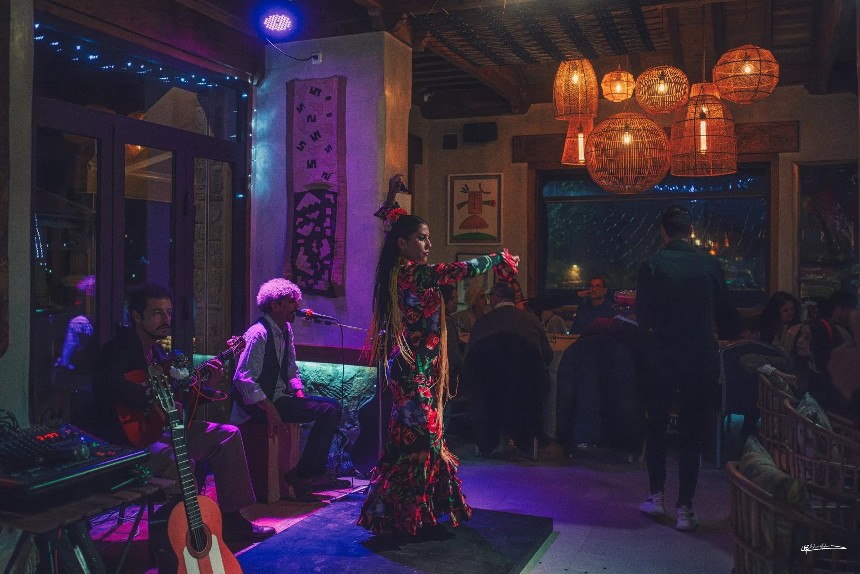 Nighttime rooftop dining table at Triana in Chefchaouen