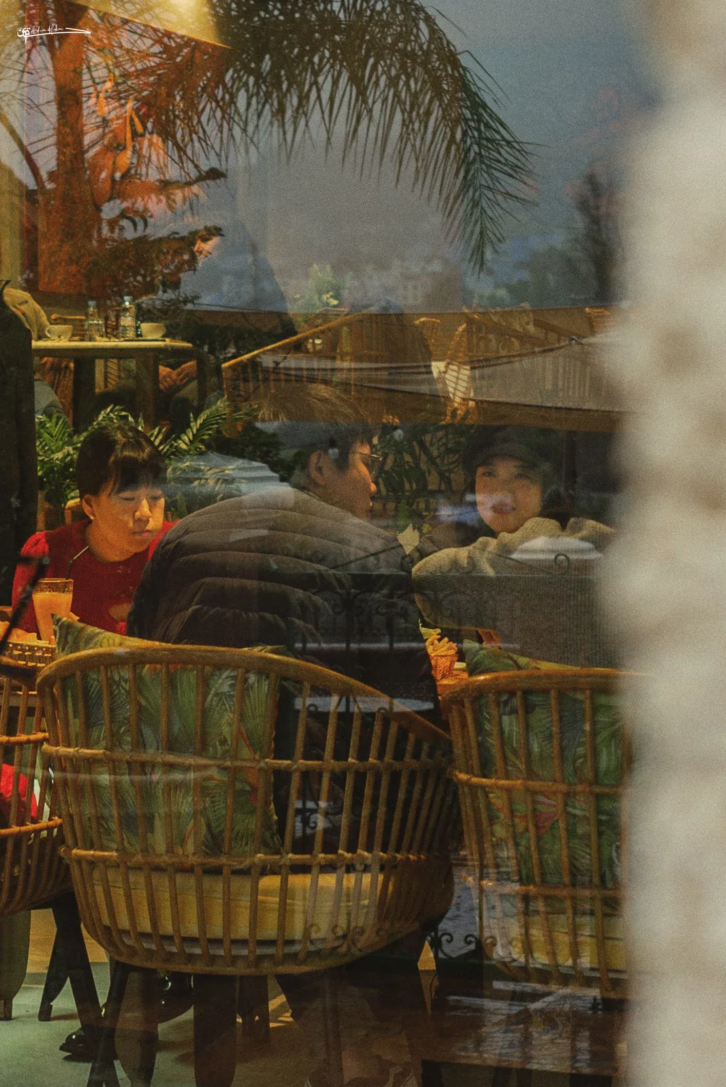 Guests enjoying the Triana rooftop terrace at night in Chefchaouen